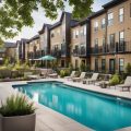 A modern build-to-rent community with colorful townhouses, lush landscaping, and communal amenities like a pool and fitness center