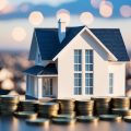 A house surrounded by money representing a gold mine for an investor finding an off-market real estate deal.