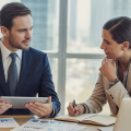Two CRE practitioners discussing conduit spreads in commercial real estate financing.